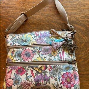 Sakroots Pink and Blue Crossbody Bag with Floral Design